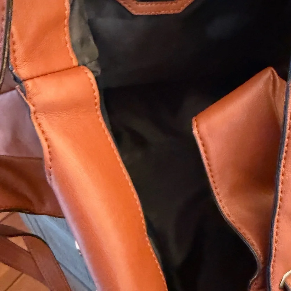 Zara faux leather handbag, adjustable straps, and very roomy.